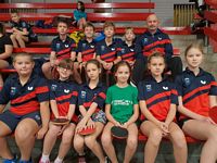 Uczniowie Szkoły Sportowej z trenerem J. Fominym na zawodach